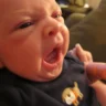 newborn sneezing